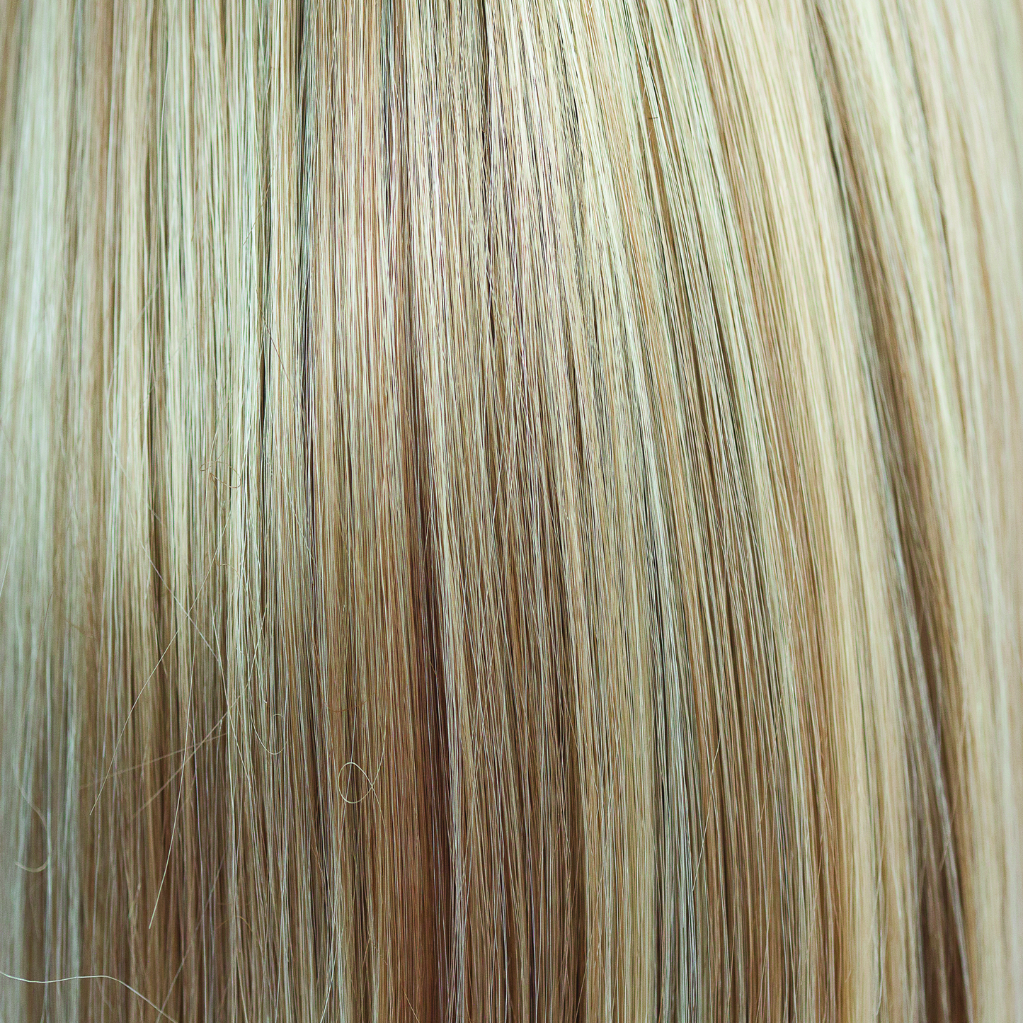 Champagne Blush - A very natural but very interesting champagne honey blond with tones of toffee and buttermilk subtlety getting lighter towards the ends. Champagne Blush is a decedent and flattering tone very wearable.