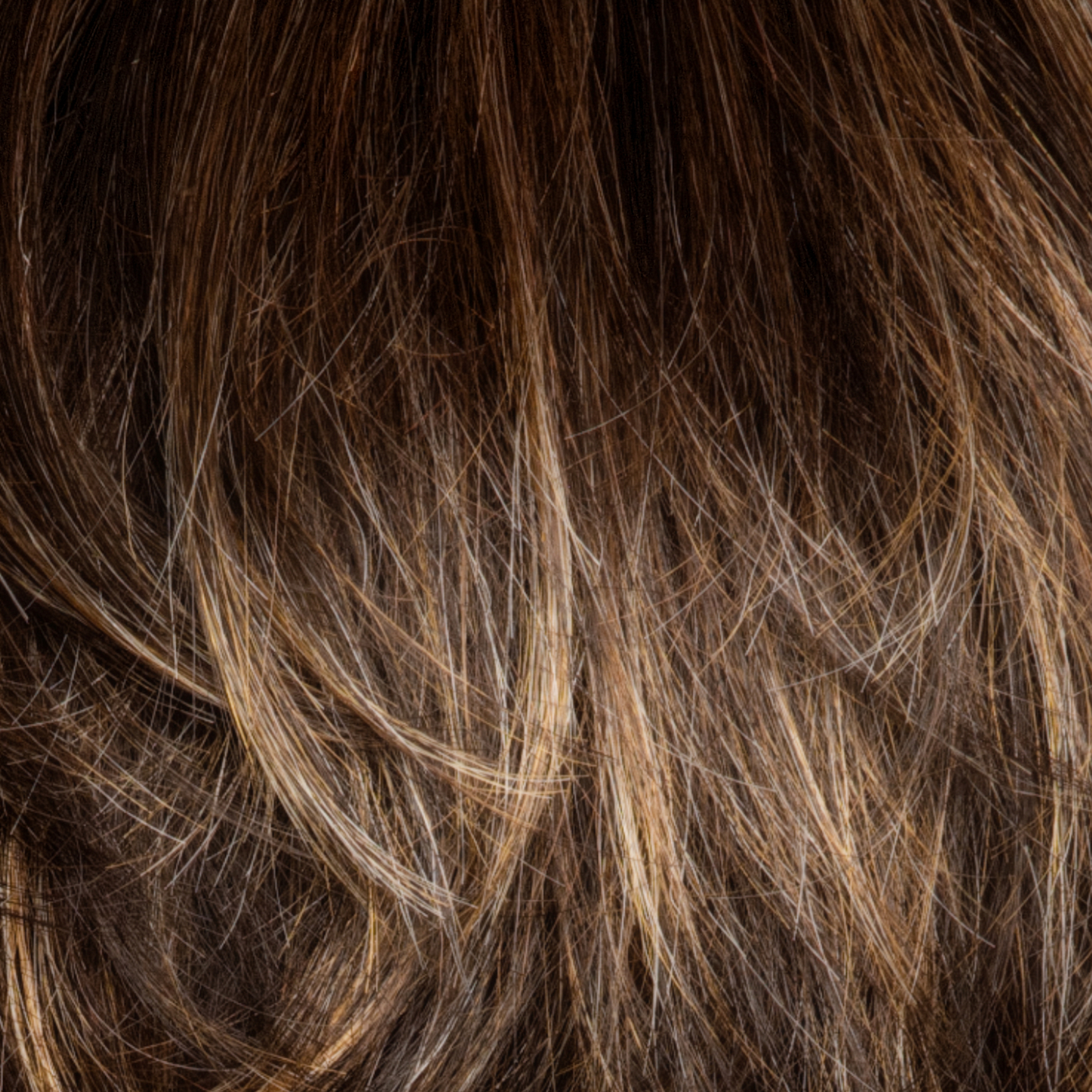 Chocolate Twist - Beautifully blends the dark brown color Cappucino as the base, with coppery blond highlights and tipped ends. The result is a multi-dimensional natural and flattering brown.
