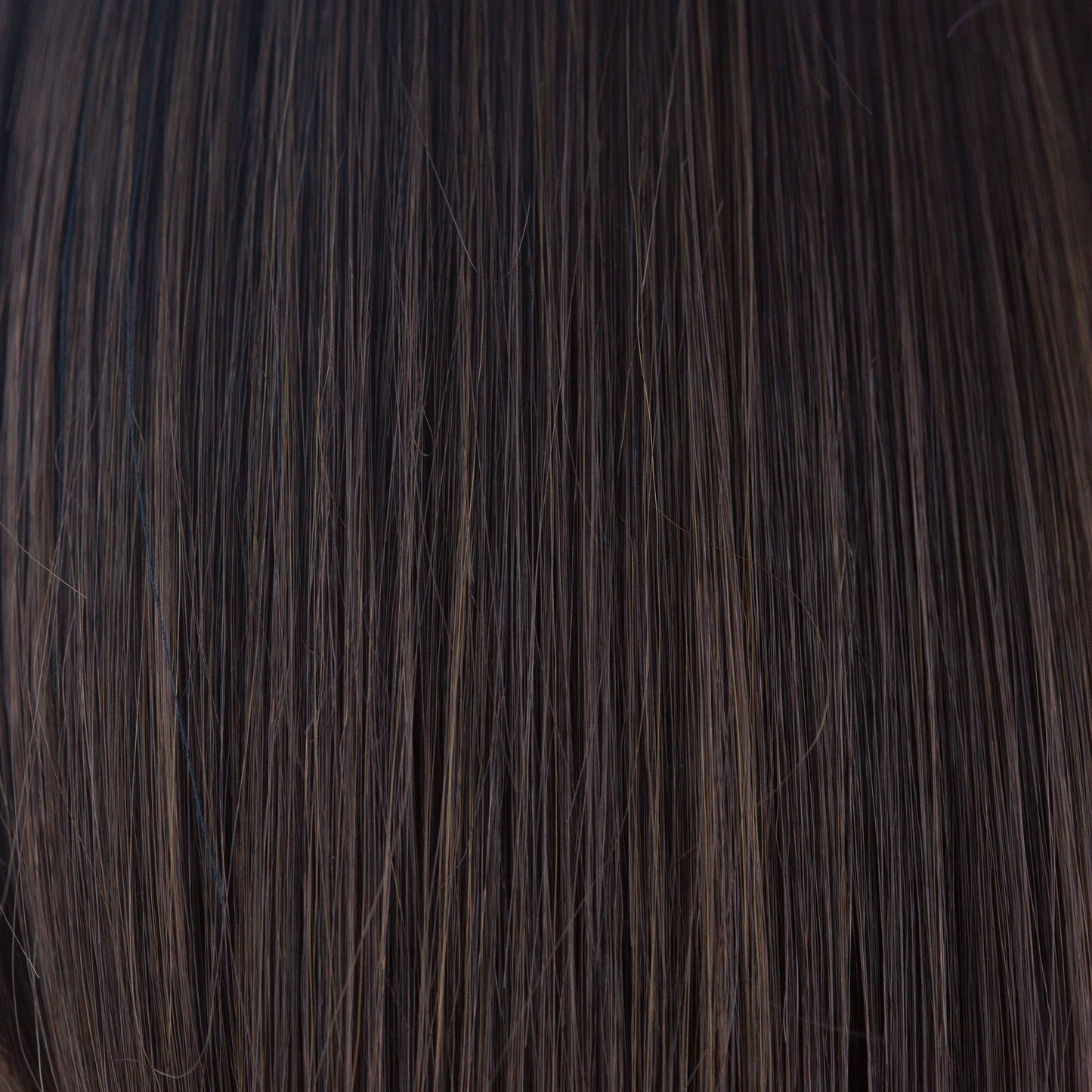 Dark Chocolate - The perfect neutral brown. Carefully crafter by blending a rich, deep chocolate brown with a cool medium brown tone, this color will look natural and real to those looking for a dark color.