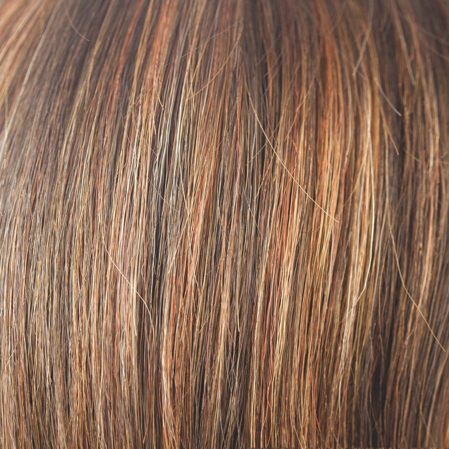 Dark Rust - A medium to light multi-tonal red with highlights and lowlights of rusty red shades and apricot bronze with tastefully placed slices of Tuscan terracotta.