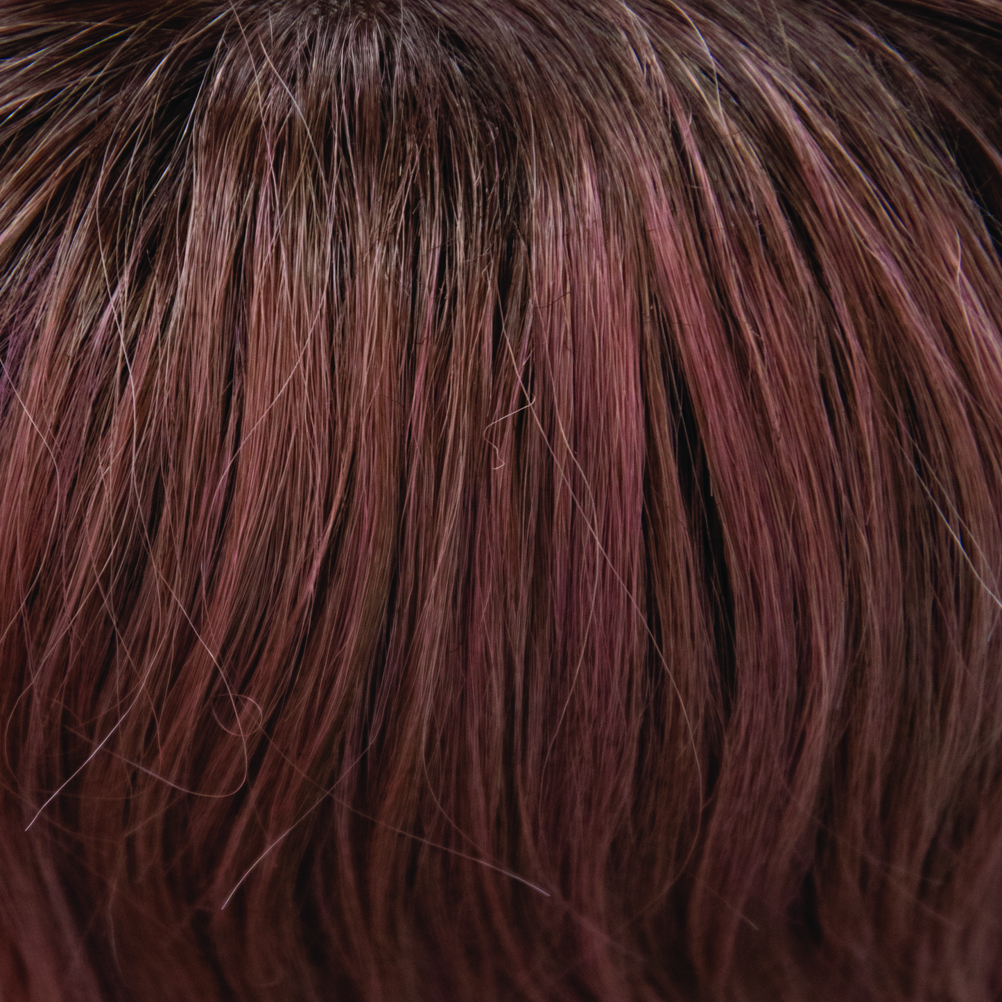Dusty Rose - A smoky fused medium coral red base with warm dark brown roots. Fresh-tone beauty in bloom.