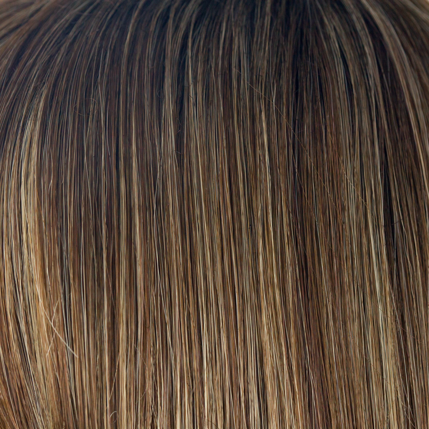 Iced Mocha-R - Balances our Medium Brown-base with cool light blond highlights. Warm, dark root color creates any type of realistic length, giving off a stunning look.