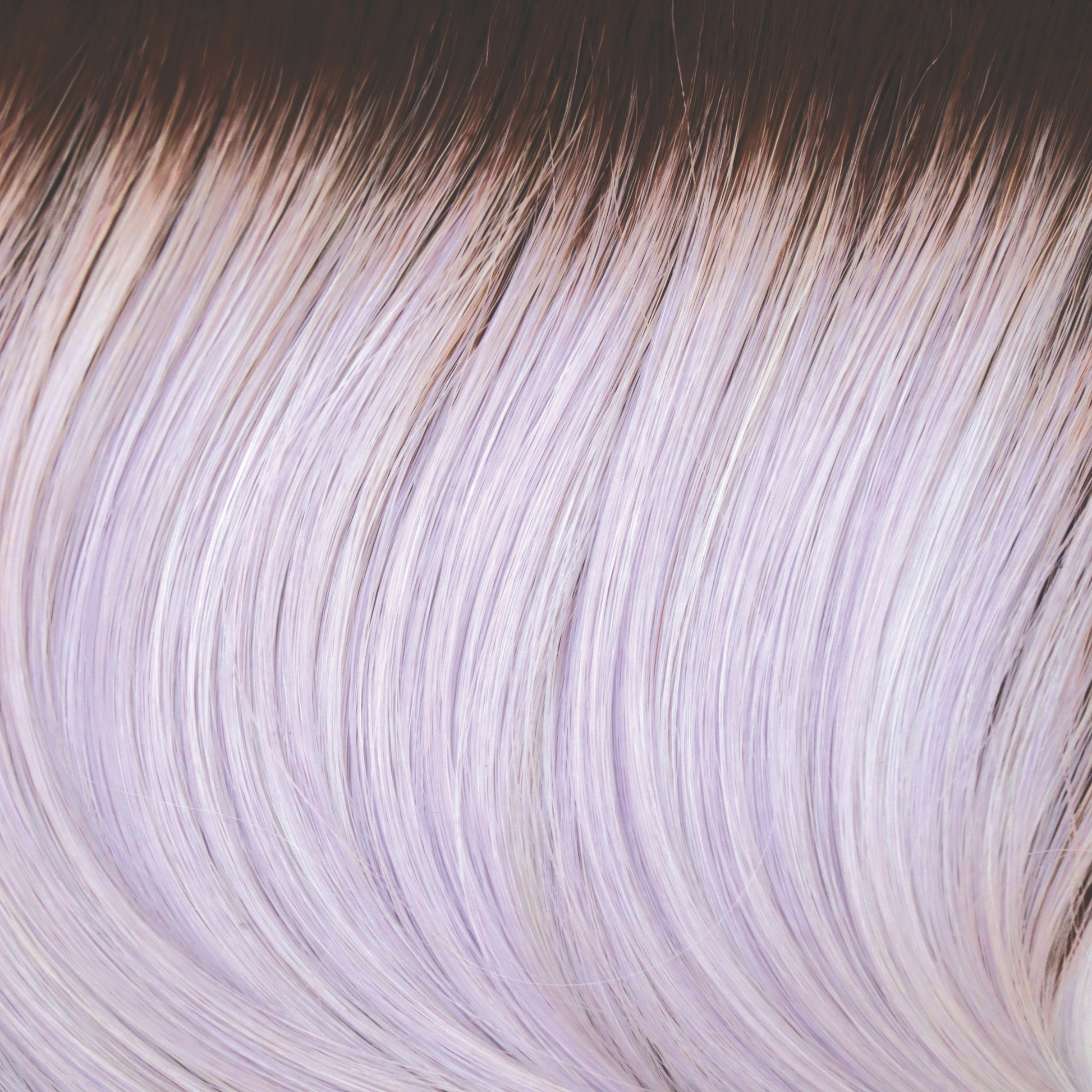 Lavender Blush-R  -  A dark chocolate root running into a lavender silver and iced mauve color. There is no wonder this violety vixen has been such a big hit.