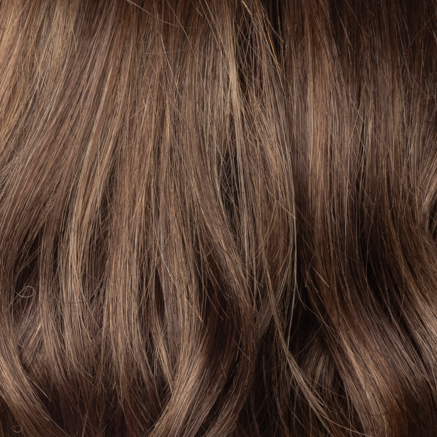 Maple Frost - A stunning new color is beautiful a mid brown with a slight chocolate brown root and has an array of highlights and lowlights of both warm maple blonds and toffee shades with frosty undertones.