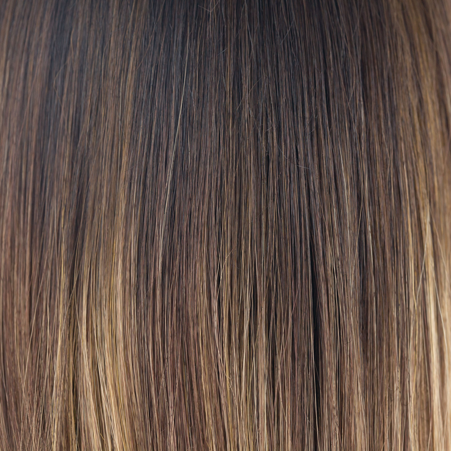 Marble Brown-LR - A long rooted beauty that combines the perfect mixture of warm dark brown and medium golden blond. Long, warm dark brown roots add a sophisticated finish.