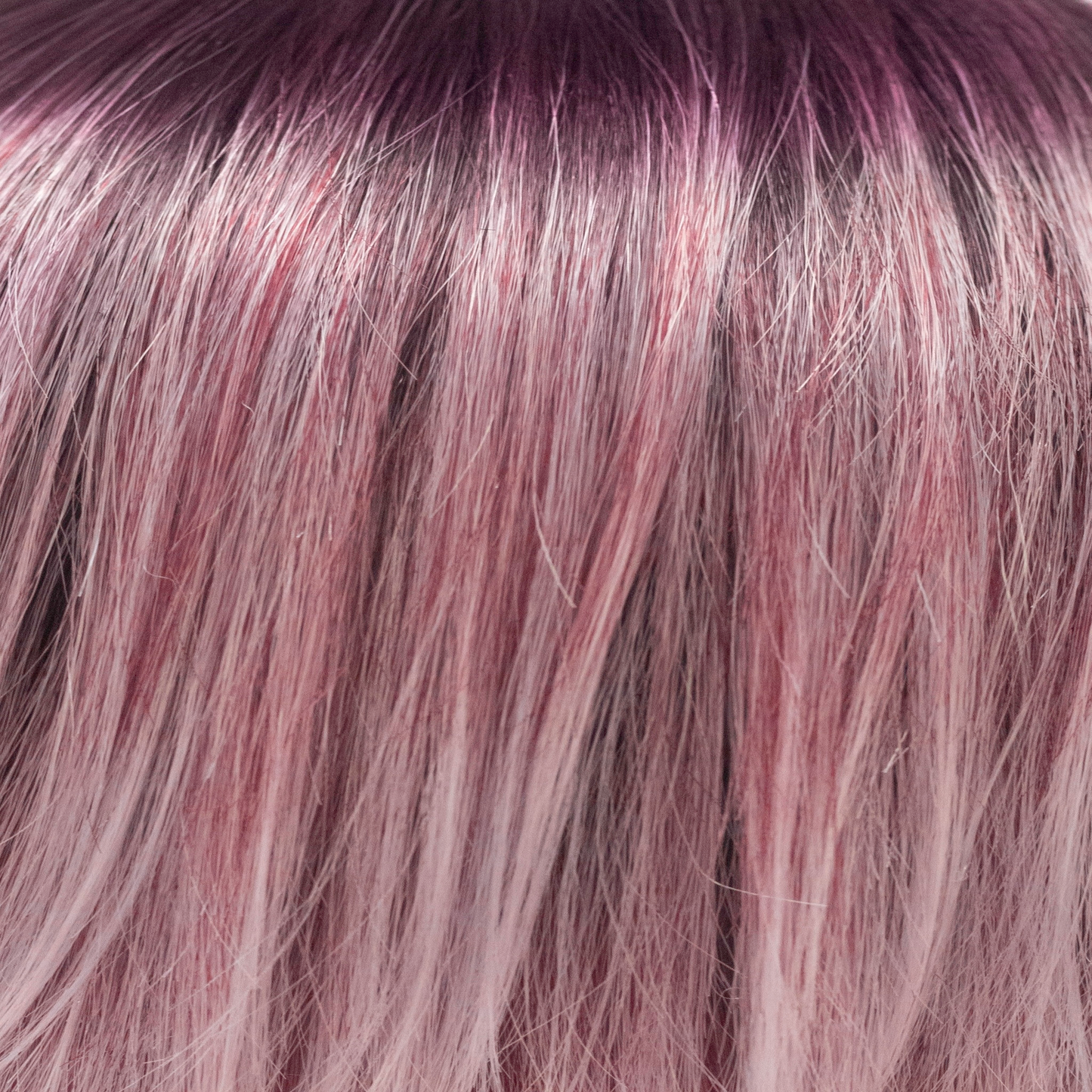 Melted Plum - A very intelligent color! It has dark amethyst stretch roots that blend into medium vibrant violets and finish to pale lavender blond ends. This suits all……. super, vivid and chic!