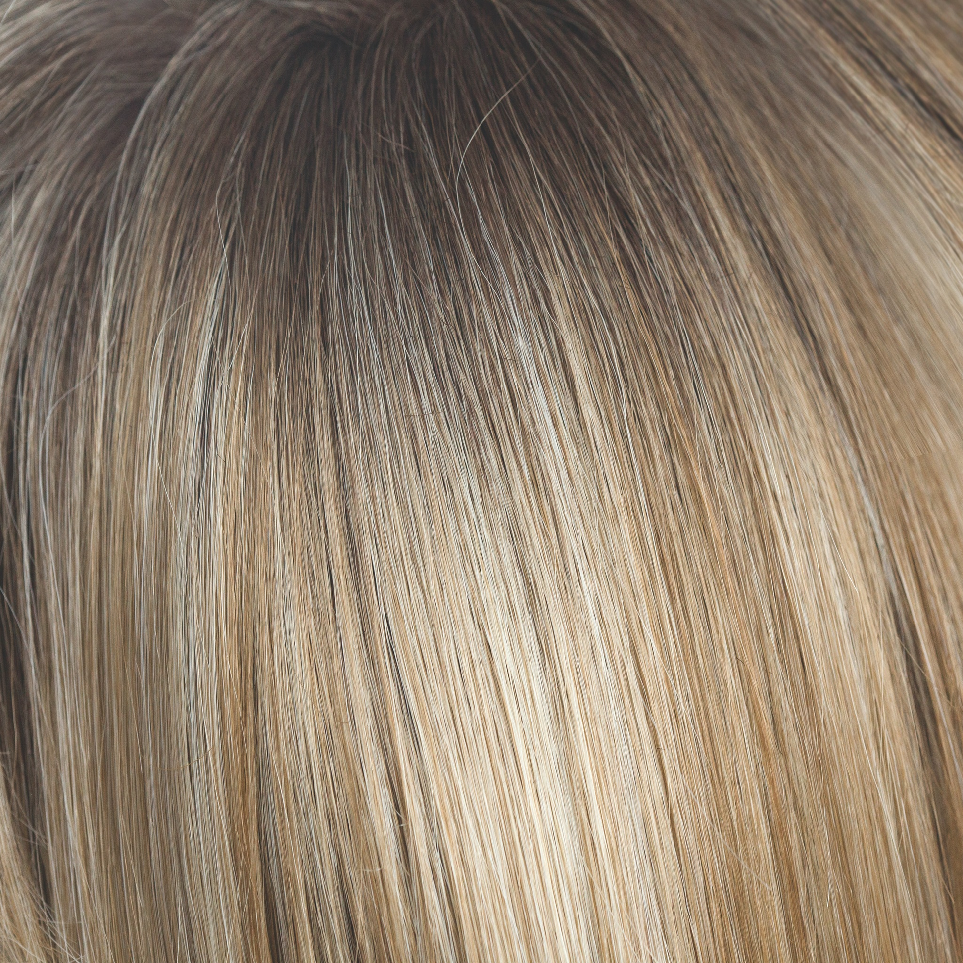 Rose Gold-R  -  A medium to dark golden brown and blends into the rose gold blond with rooted blond and hints of rose and hues of peachy coral.