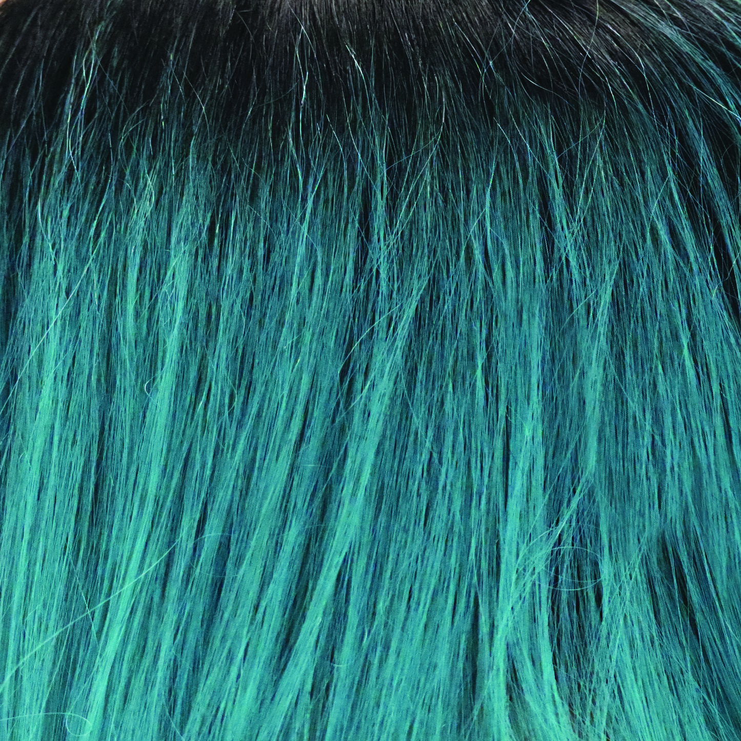 Royal Emerald - A cool dark root shattering into a bluey green, oceanic color.