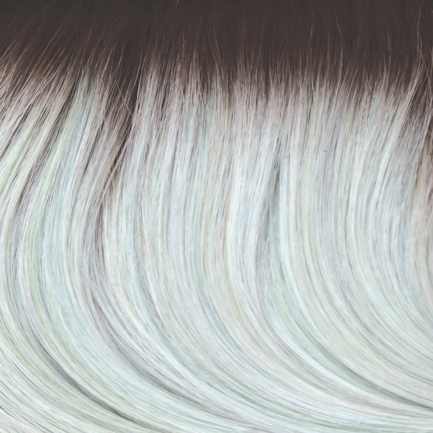 Seaglass-R - This beige brown rooted color is captivating. The root seamlessly smudges into a pale peppermint green with hints of blue jade.