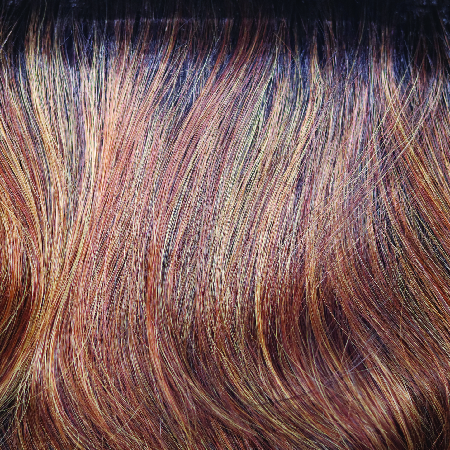 Shaded Amber - A dark amber brown root regrowth and adorable toned slices of copper blond and paprika.